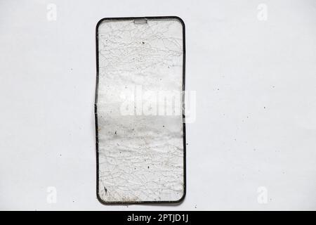 broken protective tempered glass for the phone Stock Photo