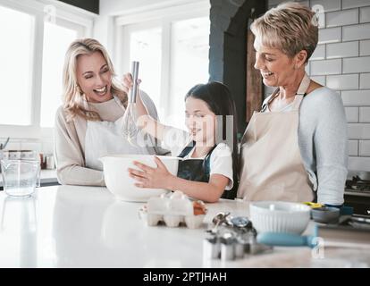 https://l450v.alamy.com/450v/2ptjhah/mom-grandma-and-child-baking-in-kitchen-happy-generations-of-family-teaching-and-learning-in-home-love-support-and-home-cooking-together-happy-gi-2ptjhah.jpg