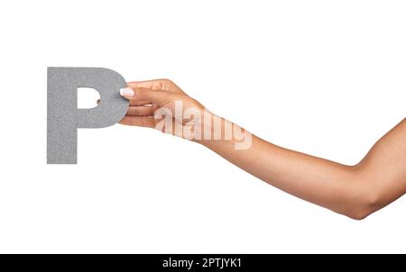 P is for Please. A young woman holding a capital letter P isolated on a white background Stock Photo