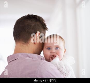 Daddys little angel. a young father holding his adorable baby girl Stock Photo