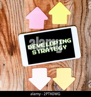 Conceptual display Developing Strategy, Word for Organizations Process Changes to reach Objectives Stock Photo