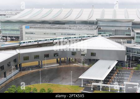 April 26, 2023, Tokyo, Japan: A view of Haneda Airport Int. Terminal 3 from the Hotel Villa Fontaine Premiere, part of the new mix-use complex (Haneda Airport Garden). The Haneda Airport Garden complex has finally opened after a three-year delay caused by the pandemic. The complex includes a 1,717-room airport hotel with a natural hot spring spa, MICE-ready event space and meeting rooms that aim to strengthen Haneda Airport's position as a 24-hour international hub airport. Additionally, the complex has around 80 commercial establishments that offer a variety of retail shops, eateries, and a f Stock Photo