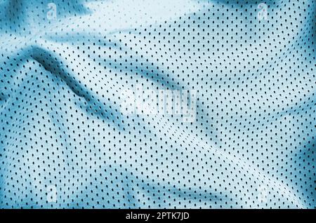 Close up of light blue polyester nylon sportswear shorts to created a textured background Stock Photo