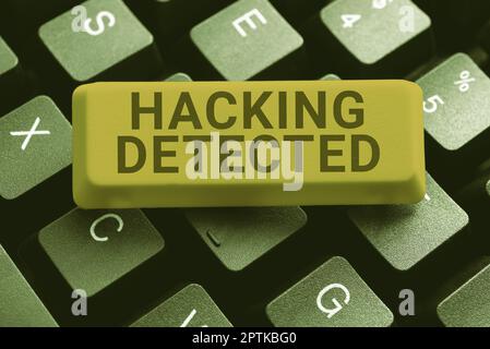 Hand writing sign Hacking Detected, Word Written on activities that seek to compromise affairs are exposed Stock Photo