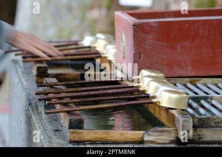 Dippers prepared for the ceremonial purification rite known as temizu ...