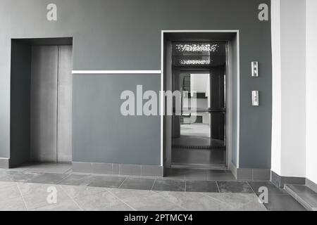 Stylish elevator with open and close doors Stock Photo