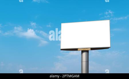 Blank billboard with empty screen over blue sky cloud background. For advertisement design or text. mockup template Stock Photo