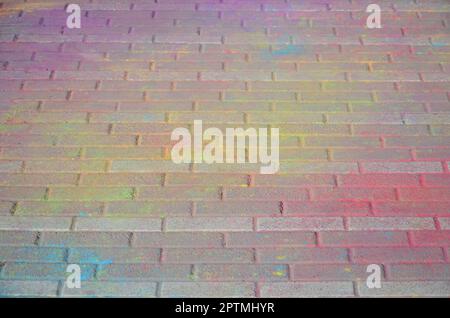 Multi colored earth, paving slabs, powder coated with dry colors at the Holi festival close up Stock Photo