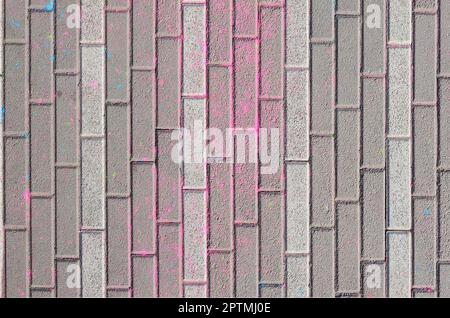 Multi colored earth, paving slabs, powder coated with dry colors at the Holi festival close up Stock Photo