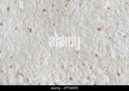 Homemade flat bread Turkish lavash background texture top view. Pita bread Stock Photo