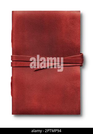 Old worn red leather notebook isolated on white background, closed with a band Stock Photo