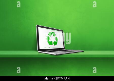 Laptop computer on a shelf with a recycling symbol on screen ...