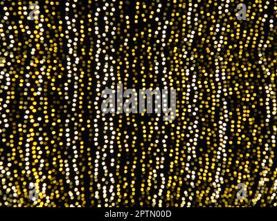 Hanging garlands against the background of the night sky. Festive decoration of city streets. Garlands of yellow, white and gold lights and bulbs. Bea Stock Photo