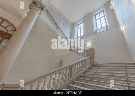 TURIN, ITALY - CIRCA MAY 2021: luxury staircase made of marble in an antique Italian palace Stock Photo