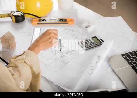 Architect interior design drawing with divider compass on house plan ...