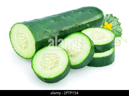 Slicing cucumber and cucumber slices isolated on white background. Stock Photo