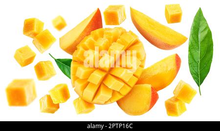 Mango fruit slices and mango cubes flying isolated on white background. Stock Photo