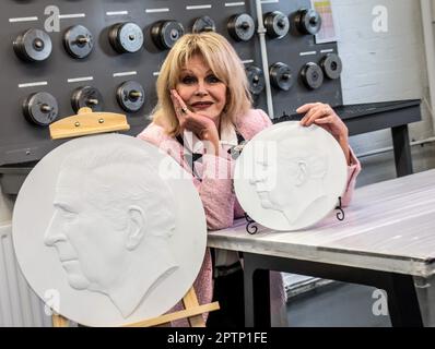 London, UK. 28th Apr, 2023. A week before the Coronation, ‘National Treasure' Joanna Lumley with the mould of the new first King Charles coins for Gibraltar, at Tower Mint1-21 Carew Street, London .Paul Quezada-Neiman/Alamy Live News Credit: Paul Quezada-Neiman/Alamy Live News Stock Photo