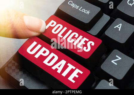 Text caption presenting Policies Update, Word for act of adding new information or guidelines formulated Stock Photo