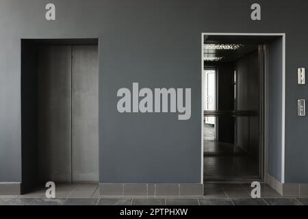 Stylish elevator with open and close doors Stock Photo