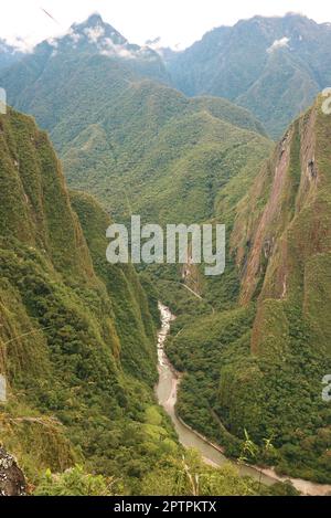 Stunning Aerial View of Aguas Calientes Town and Urubamba River as Seen from Mt. Huayna Picchu, Machu Picchu Fortress, Cusco Region, Peru Stock Photo
