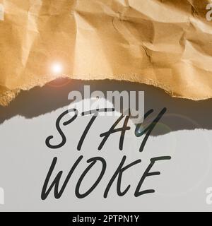 Conceptual caption Stay Woke, Conceptual photo being aware of your surroundings and things going on Keep informed Stock Photo