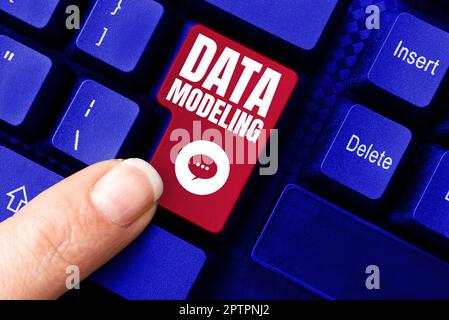 Text caption presenting Data Modeling, Business overview process of transferring data between data storage systems Stock Photo