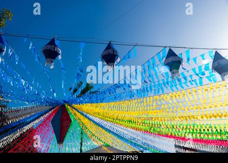Valenca, Bahia, Brazil - June 24, 2022: Decoration with balloons and colorful flags for the June festival of Sao Joao in the city of Valenca, Bahia. Stock Photo