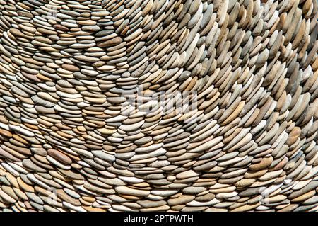 Close-up of strung pebbles Stock Photo