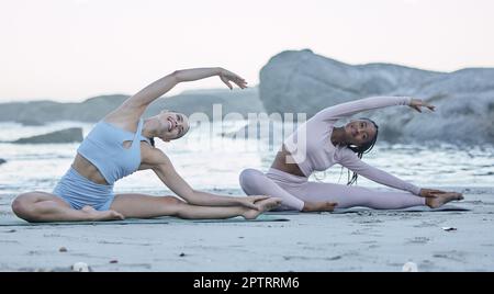 Beach, yoga and stretching women or team with fitness, exercise and cardio  wellness, body goals and accountability in morning. Diversity, pilates and  Stock Photo - Alamy