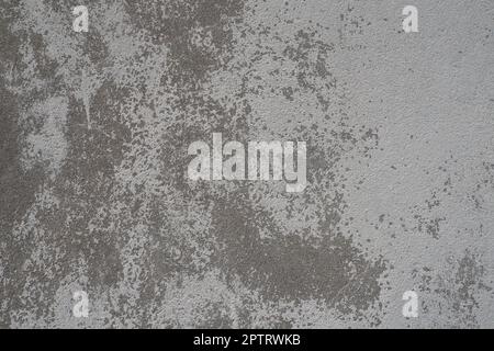 Plastered wall texture. Whitewash surface. Abstract background. Retro wall built structure texture. Cracks and bumps on the concrete wall. Uneven colo Stock Photo