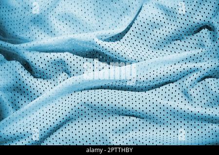 Close up of light blue polyester nylon sportswear shorts to created a textured background Stock Photo