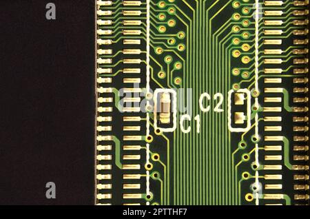 Close up of colored micro circuit board. Abstract technology background. Computer mechanism in details Stock Photo