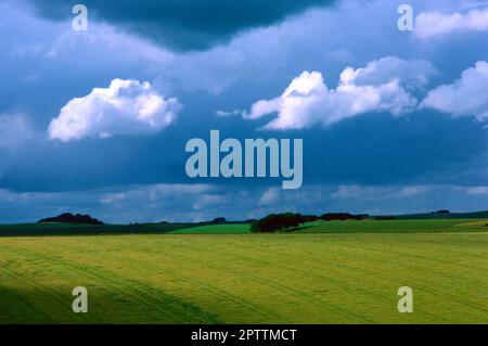 Storm clouds gather over downland countryside, UK Stock Photo