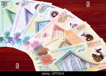 Papua New Guinean money - kina a business background Stock Photo