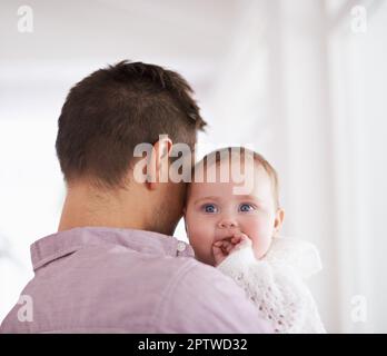 Daddys little angel. a young father holding his adorable baby girl Stock Photo