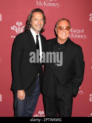 Fashion designer Michael Kors, left, and his husband Lance LePere, right,  attend the Roundabout Theatre Company 2022 Gala at the Ziegfeld Ballroom on  Monday, March 7, 2022, in New York. (Photo by