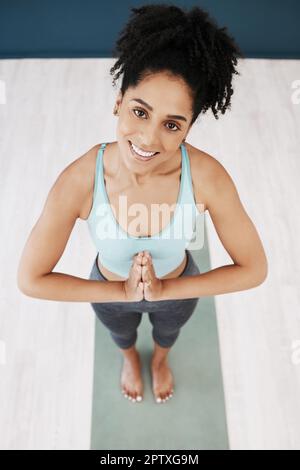 Portrait, black woman and namaste meditation in yoga studio, fitness club  and exercise motivation, healthy lifestyle or mindfulness. Happy young  afric Stock Photo - Alamy