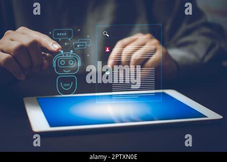 ChatGPT Chat with AI or Artificial Intelligence. Digital chatbot, robot application, OpenAI generate. Futuristic technology, Man using tablet computer Stock Photo