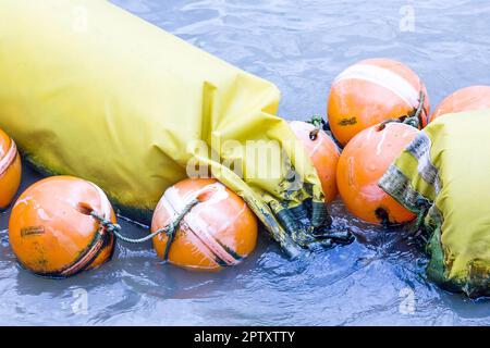 Orange buoy Used in the form of water made from special plastic that is strong and durable Stock Photo