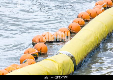 Orange buoy Used in the form of water made from special plastic that is strong and durable Stock Photo