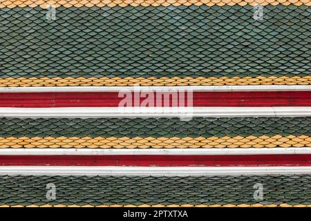 Terracotta tiles are stacked into layers. Popularly made into a Thai temple roof Stock Photo