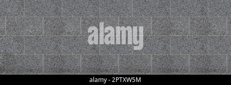 Monochromatic texture of granite surface. Detailed photo of the treated glossy granite stone, which is used as tiles for walls and floors Stock Photo
