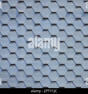Modern roofing and decoration of chimneys. Flexible bitumen or slate shingles in hexagon shape. Top view texture Stock Photo