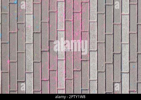 Multi colored earth, paving slabs, powder coated with dry colors at the Holi festival close up Stock Photo