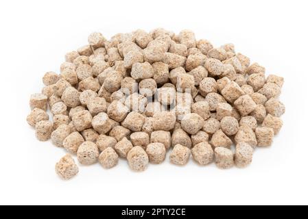 Oat bran extruded on a white background. Bunch of bran. healthy eating Stock Photo