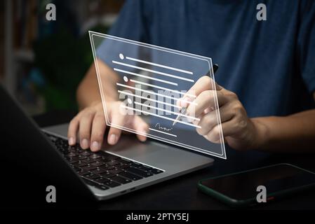 Electronic Signature Concept.e-signing Businessman signs electronic contract online documents. Stock Photo