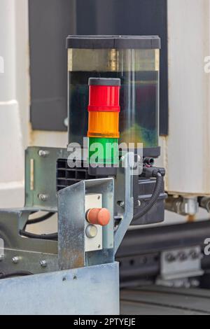 Stack Tower Traffic Lights and Emergency Stop Button Machine Signal Stock Photo