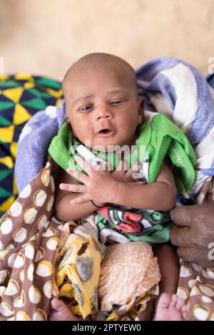 A newborn baby, part of an IDP family, in Segou Region, Mali, West Africa. 2022 Mali drought and hunger crisis. Stock Photo
