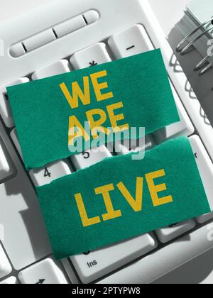 Text caption presenting We Are Live, Word for continuous report or chat that is streamed in real time Stock Photo